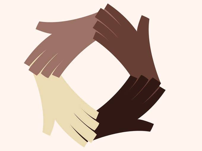 hands linked various skin tones