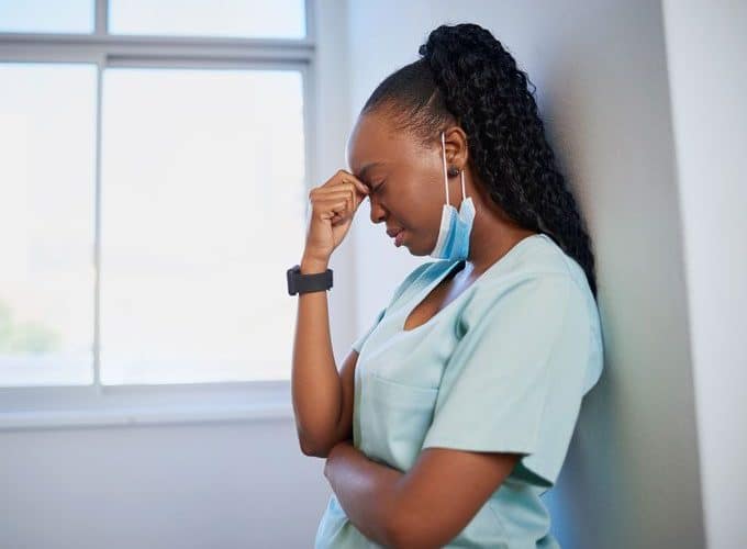 graphic of frustrated Black nurse